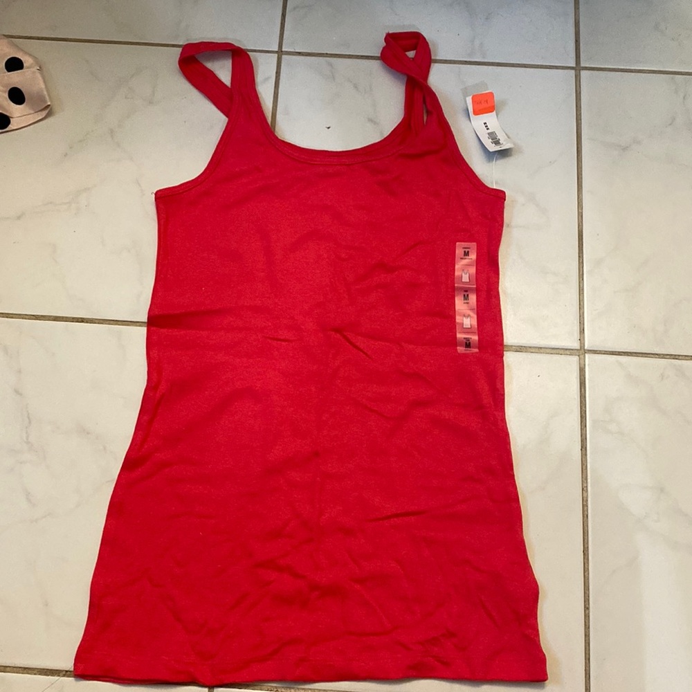 Color pink cami top! Never worn. New with tags!!